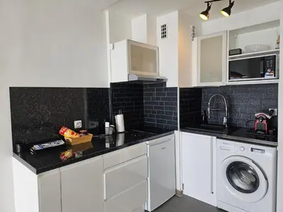 Cuisine ou kitchenette dans l'établissement Le Soleil