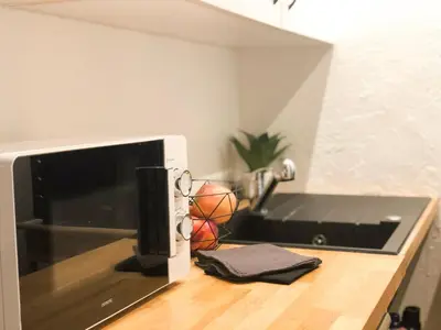 Cuisine ou kitchenette dans l'établissement Studio vieil Antibes
