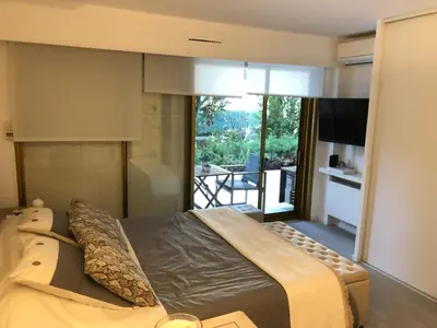Un ou plusieurs lits dans un hébergement de l'établissement Luxe apartment center 6pers 300m2 privare garden