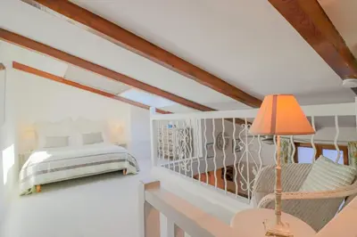 Un ou plusieurs lits dans un hébergement de l'établissement Duplex au coeur du vieil Antibes