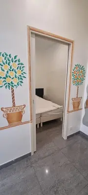 Un ou plusieurs lits dans un hébergement de l'établissement One Bedroom André