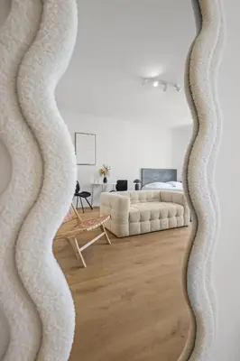 Coin salon dans l'établissement Magnifique appartement - 15 minutes a pieds PALAIS