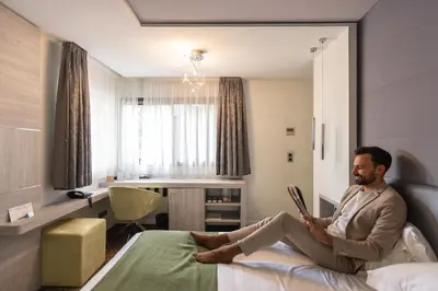 Coin salon dans l'établissement Cézanne Hôtel