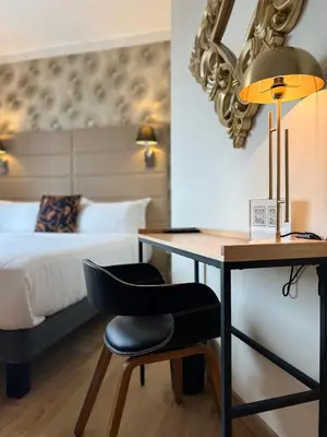 Un ou plusieurs lits dans un hébergement de l'établissement Hôtel La Villa Cannes