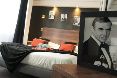 Un ou plusieurs lits dans un hébergement de l'établissement ATH hôtel Athénée
