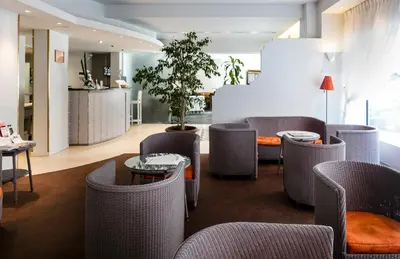 Coin salon dans l'établissement Best Western Astoria