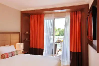 Un ou plusieurs lits dans un hébergement de l'établissement AC Hotel by Marriott Ambassadeur Antibes - Juan Les Pins