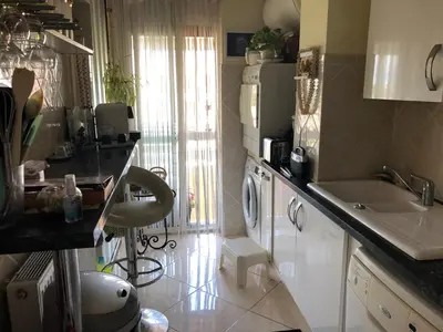 Cuisine ou kitchenette dans l'établissement appartement vue mer panoramique