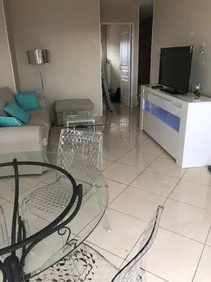 Télévision ou salle de divertissement dans l'établissement appartement vue mer panoramique