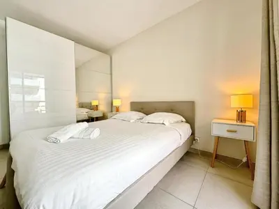 Un ou plusieurs lits dans un hébergement de l'établissement Villa D'Este - Apt 4 prs - clim - 300m plage - piscine-parking en option