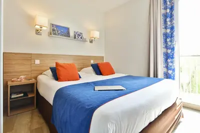 Un ou plusieurs lits dans un hébergement de l'établissement Résidence Pierre & Vacances Premium Port Prestige