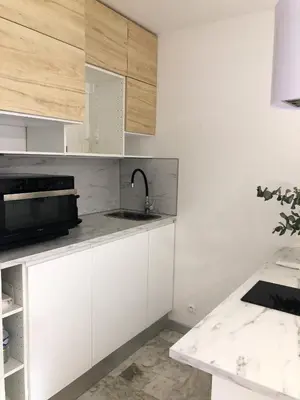 Cuisine ou kitchenette dans l'établissement Studio contemporain à Cannes avec terrasse et parking - 35 m²