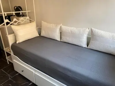 Un ou plusieurs lits dans un hébergement de l'établissement STUDIO 45 CROISETTE CANNES