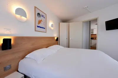 Un ou plusieurs lits dans un hébergement de l'établissement Residence Residéal Antibes