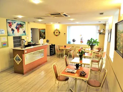 Coin salon dans l'établissement Appia Hotel