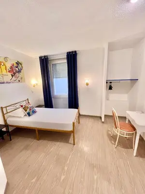 Un ou plusieurs lits dans un hébergement de l'établissement Appia Hotel