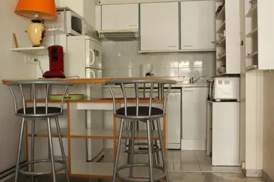 Cuisine ou kitchenette dans l'établissement STUDIO STANDING BORD DE MER ET VUE