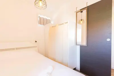 Un ou plusieurs lits dans un hébergement de l'établissement Chez Dominique - 1 chbre Centre Antibes Migrainier T2 avec AC