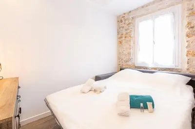 Un ou plusieurs lits dans un hébergement de l'établissement Chez Dominique - 2 chbres 2-6pers centre Antibes Migrainier T3 with AC
