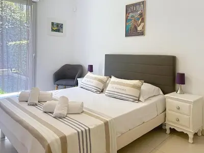 Un ou plusieurs lits dans un hébergement de l'établissement Appartement Danaé Antibes
