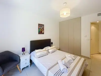 Un ou plusieurs lits dans un hébergement de l'établissement Appartement Danaé Antibes