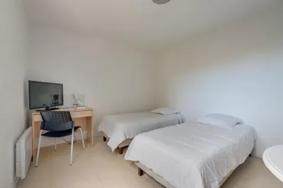 Télévision ou salle de divertissement dans l'établissement City Résidence Sophia