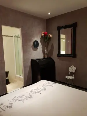 Un ou plusieurs lits dans un hébergement de l'établissement VILLA BEAUSEJOUR