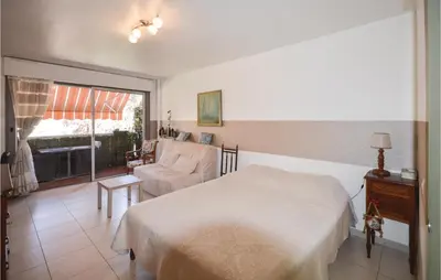 Un ou plusieurs lits dans un hébergement de l'établissement Awesome Apartment In Vallauris