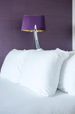 Un ou plusieurs lits dans un hébergement de l'établissement Thalazur Antibes - Hôtel & Spa
