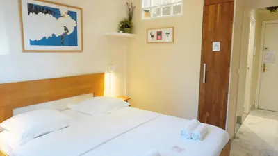 Un ou plusieurs lits dans un hébergement de l'établissement Proche Croisette, Studio Cosy by Palmazur