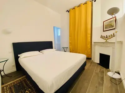 Un ou plusieurs lits dans un hébergement de l'établissement Cozy 2 bedroom apartment in the centre of Cannes near the CROISETTE