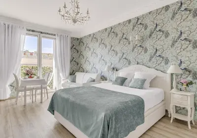 Un ou plusieurs lits dans un hébergement de l'établissement Croisette Palais Miramar Cannes Imperial