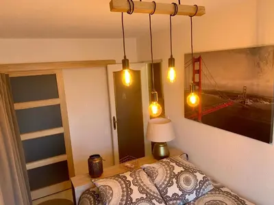 Un ou plusieurs lits dans un hébergement de l'établissement Cocoon vue Mer ☆ en face du Port de Golfe-Juan ☆