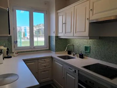Cuisine ou kitchenette dans l'établissement LES MOUETTES A
