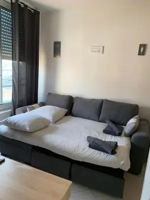 Un ou plusieurs lits dans un hébergement de l'établissement Studio CENTRE CROISETTE