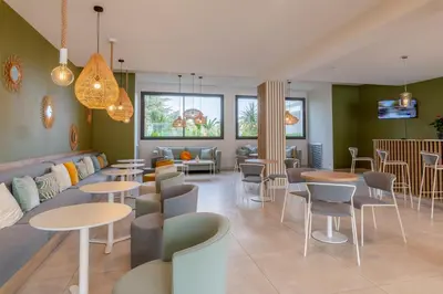 Coin salon dans l'établissement Lagrange Apart'Hôtel Antibes Olympie