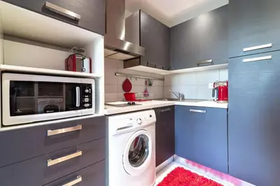 Cuisine ou kitchenette dans l'établissement Beautiful modern apartment in the heart of Cannes