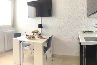 Télévision ou salle de divertissement dans l'établissement Studio 