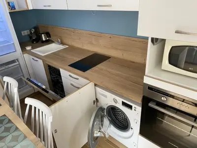 Cuisine ou kitchenette dans l'établissement Studio 30 M2 Hyper centre, Neuf, Parking Gratuit, 3 Étoiles