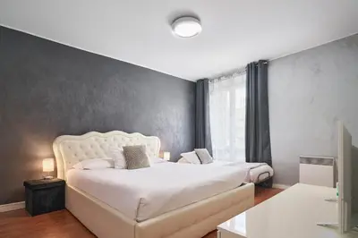 Un ou plusieurs lits dans un hébergement de l'établissement Apparthotel des Congrès et Festivals