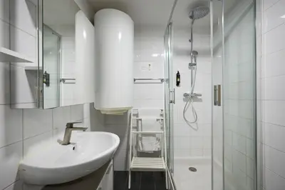 Salle de bains dans l'établissement Apparthotel des Congrès et Festivals
