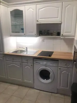 Cuisine ou kitchenette dans l'établissement Appartement Antibes juan les pins piscine et mer a 200m
