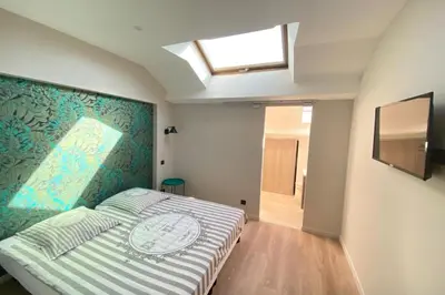 Un ou plusieurs lits dans un hébergement de l'établissement Brand new 4 bedrooms 4 bathrooms Heart of Cannes