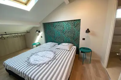 Un ou plusieurs lits dans un hébergement de l'établissement Brand new 4 bedrooms 4 bathrooms Heart of Cannes