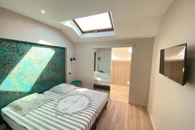Un ou plusieurs lits dans un hébergement de l'établissement Brand new 4 bedrooms 4 bathrooms Heart of Cannes