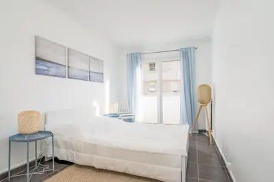 Un ou plusieurs lits dans un hébergement de l'établissement Appartement Corail - Welkeys