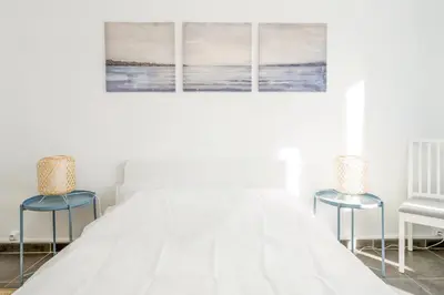 Un ou plusieurs lits dans un hébergement de l'établissement Appartement Corail - Welkeys