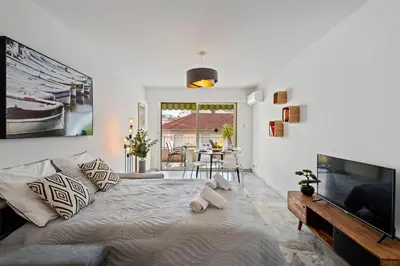 Télévision ou salle de divertissement dans l'établissement Majestic Apartment