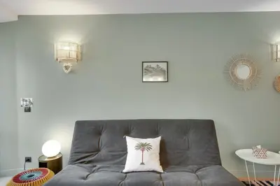 Coin salon dans l'établissement Gold Apartment