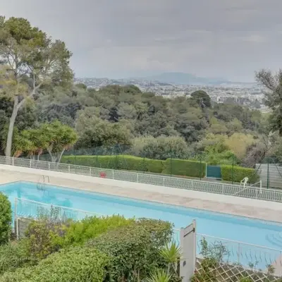 Air-conditioned house in residence with swimming pool and tennis court